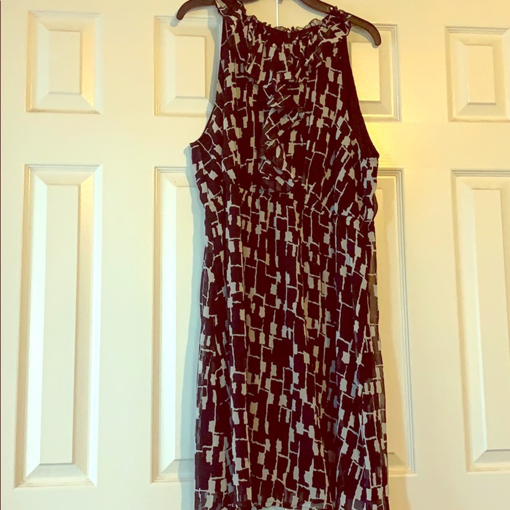 Black and grey sleeveless ruffle dress